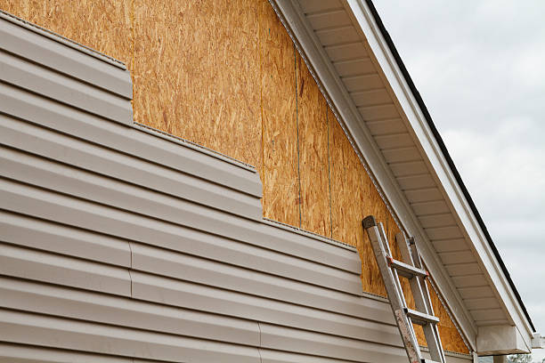 Professional Siding Contractor technician working in Auburn, NY